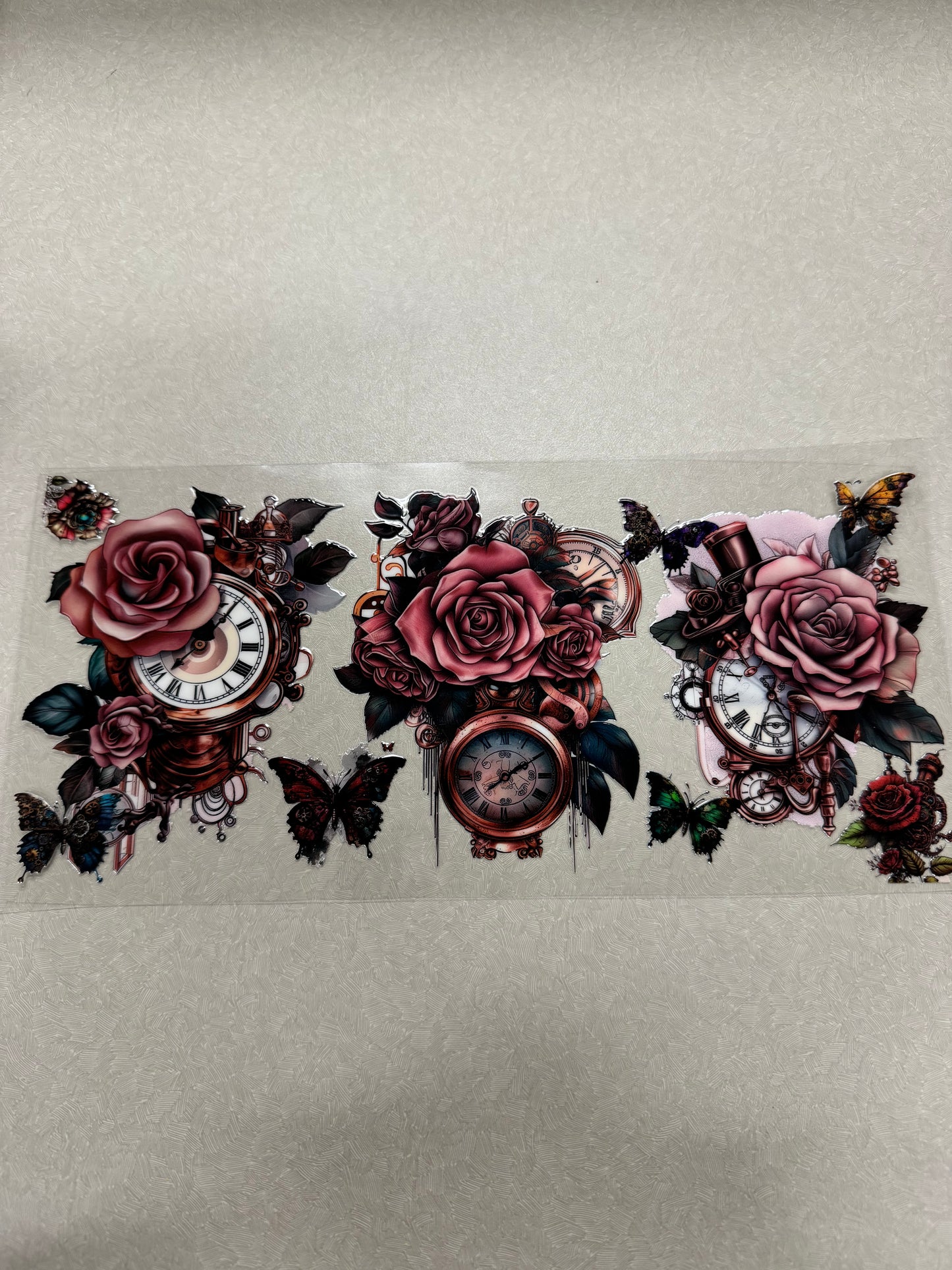 Deep pink roses with clocks