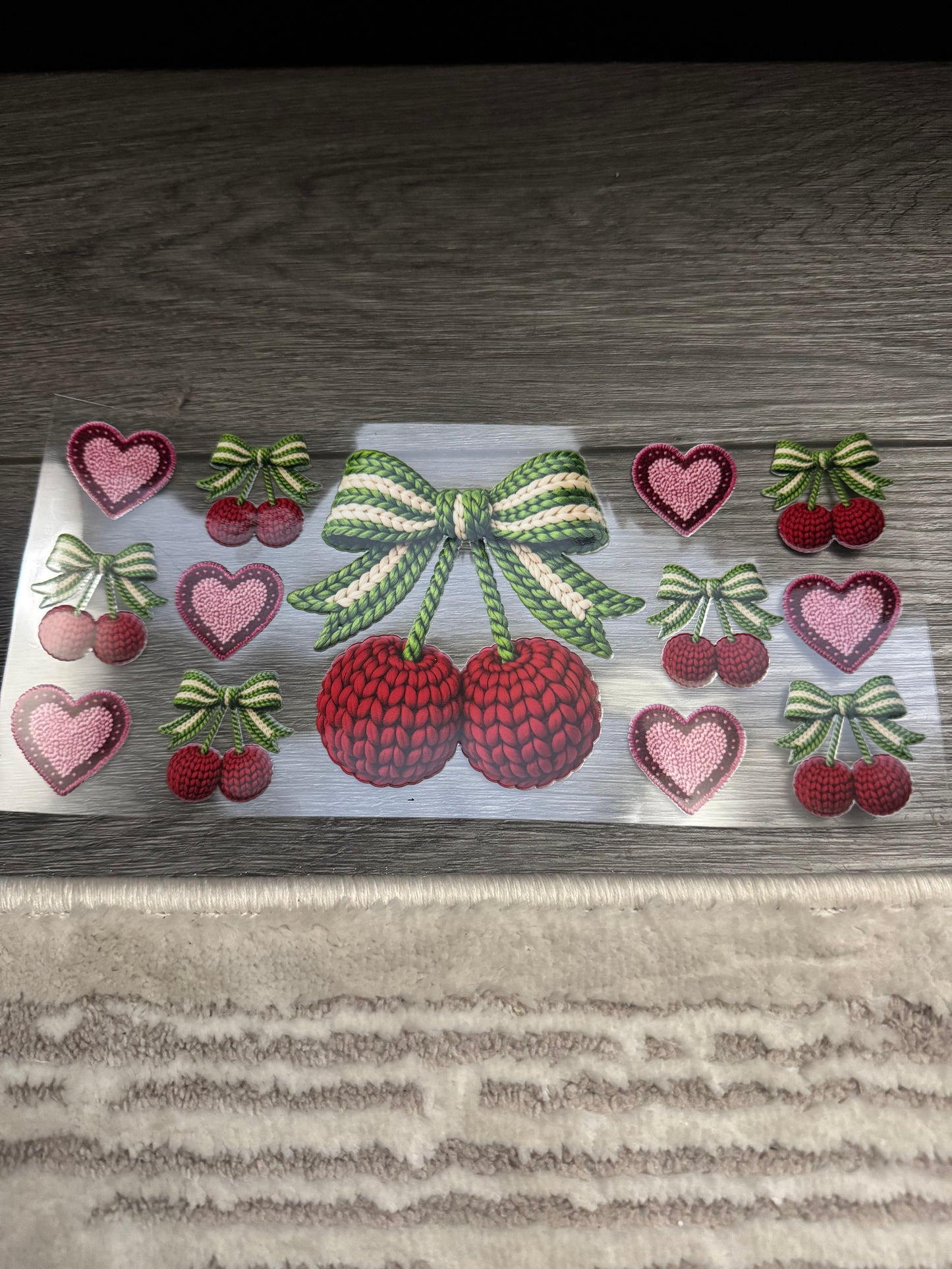 Cherry with green bow